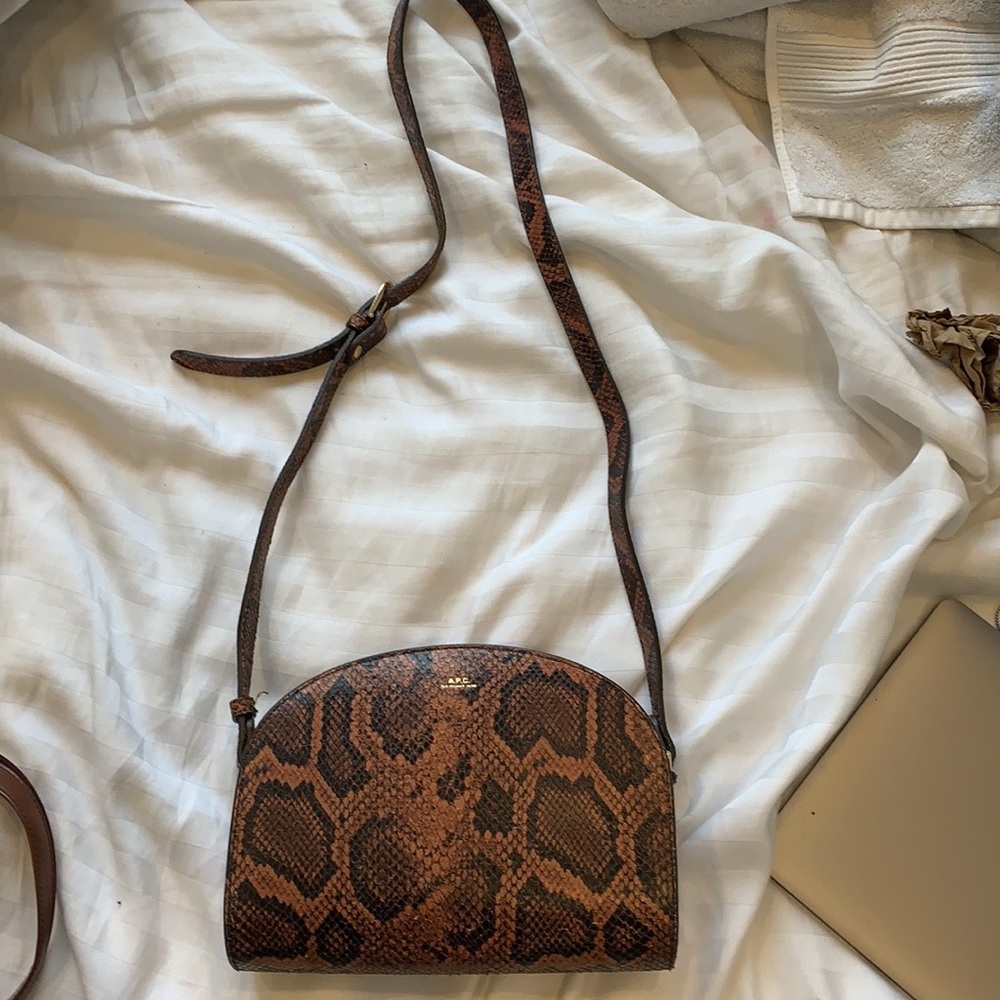 Half Moon A.P.C. crossbody bag in python print